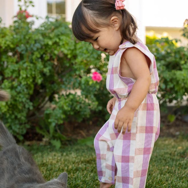 Pink and purple gingham jumpsuit for toddlers, a super cute easter 2024 outfit for kids.