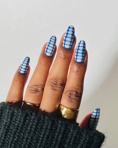 Blue croc print nails are on-trend.