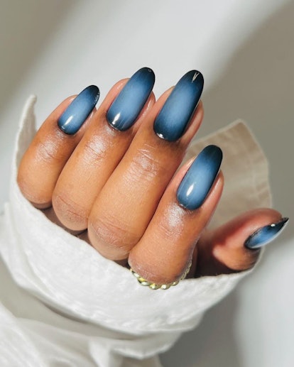Blue aura nail art is on-trend.