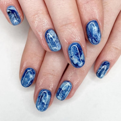 Blue watercolor nails are on-trend.
