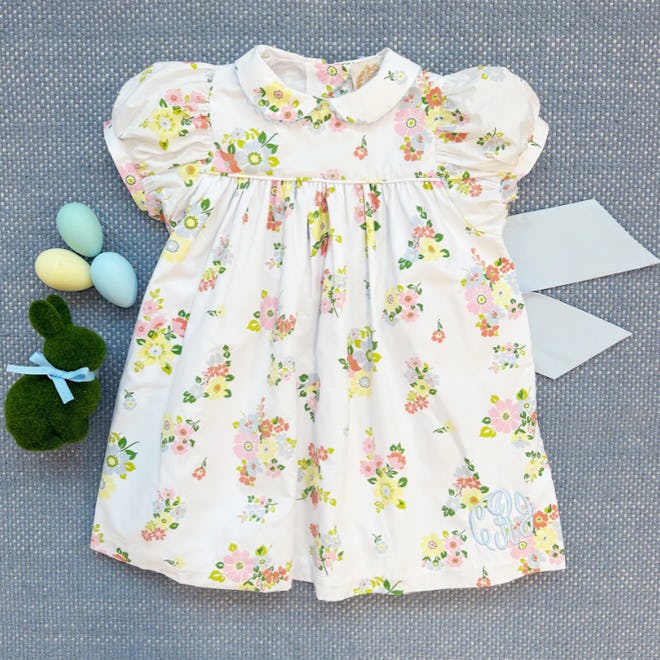 Floral toddler dress with blue bow on the back, perfect for easter 2024 outfits for kids.