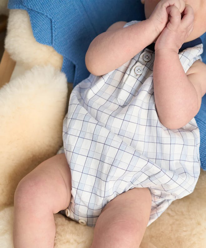 Blue and white plaid bubble romper, a cute easter 2024 outfit for baby boys.