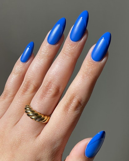 Monochromatic cobalt blue French tip nails are on-trend.