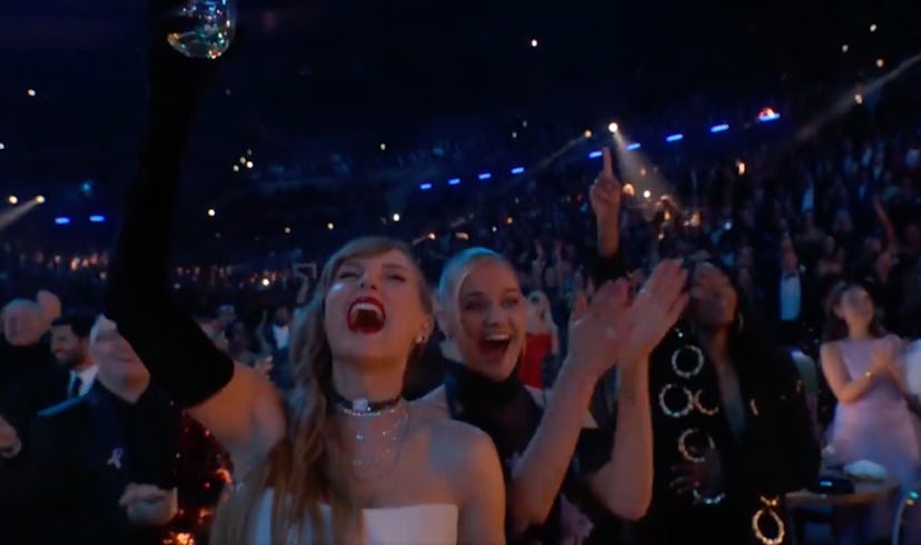 Taylor Swift cheers-ing to Miley Cyrus at the 2024 Grammys