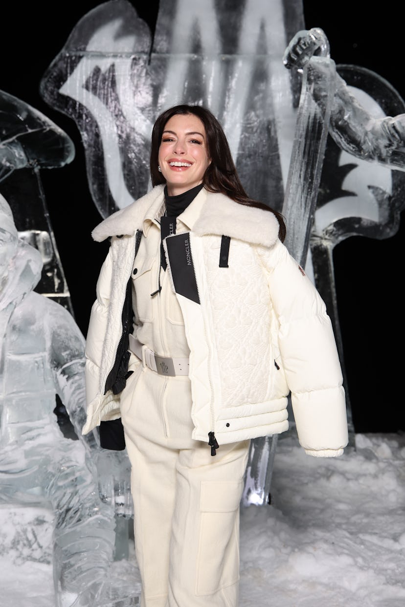 Anne Hathaway attends the Moncler Grenoble Fall Winter 2024 Fashion Show on February 03, 2024 in St ...