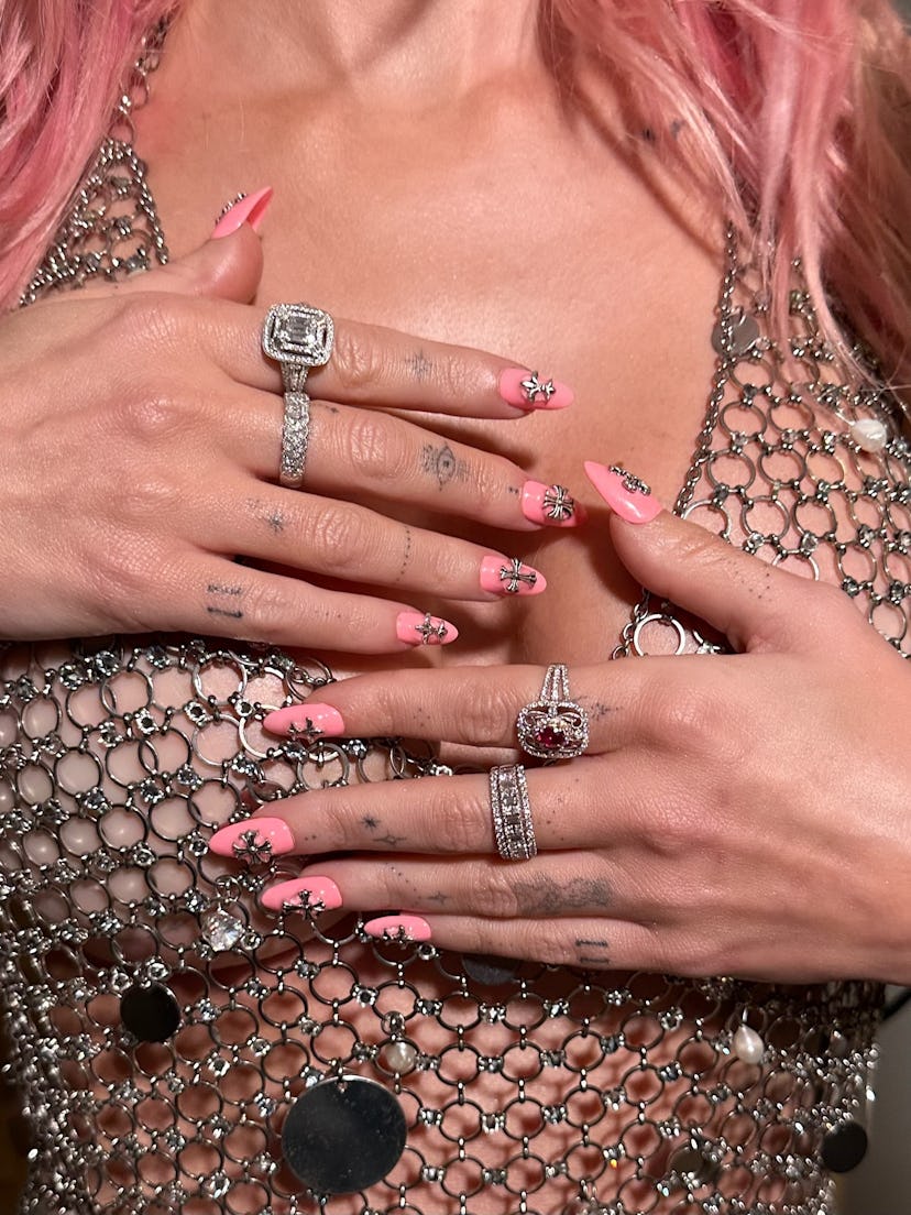 Megan Fox attended the 2024 Grammys after party with a peachy pink hair color and a manicure to matc…