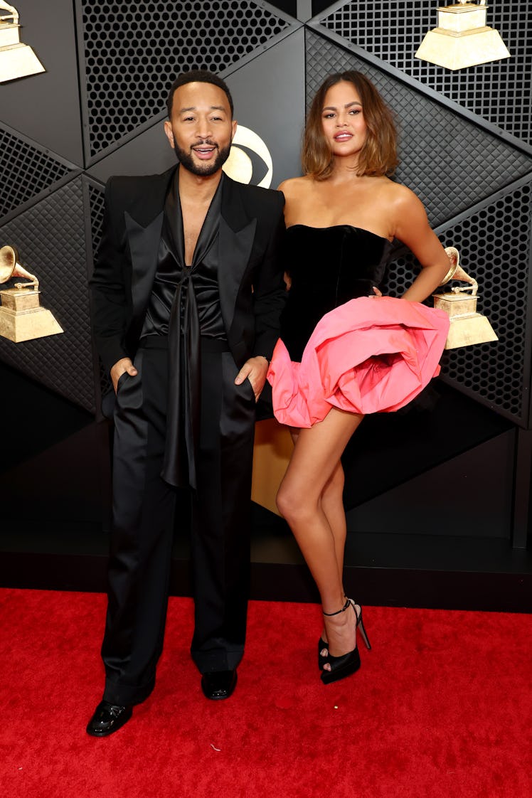 ohn Legend and Chrissy Teigen attend the 66th GRAMMY Awards at Crypto.com Arena on February 04, 2024...