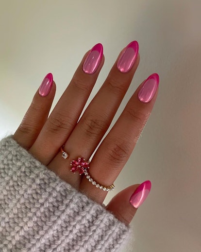 Pink chrome French tip nails are on-trend for 2024.