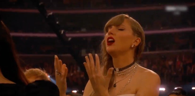 Taylor Swift lip-syncing to Celine Dion at the 2024 Grammys. 