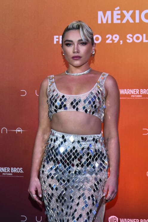 florence pugh wears a mirrored bra and skirt at dune 2 photocall