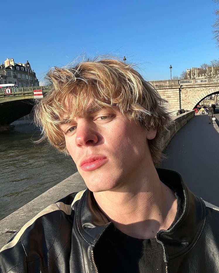 Jack Wright snaps a selfie by the river in Paris. 