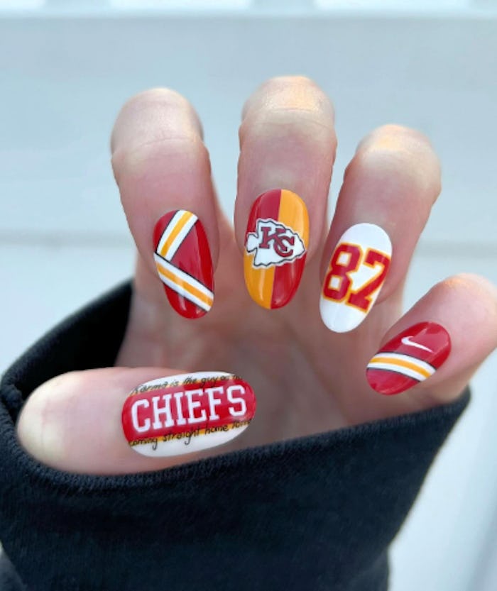 Red and yellow chiefs nails, the perfect super bowl nails for chiefs fans.