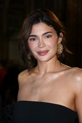 Kylie Jenner wearing Kylie Cosmetics Power Plush Longwear Foundation at Paris Fashion Week FW24.