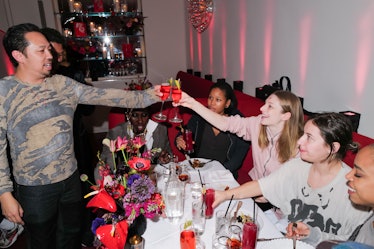 hunter schafer and humberto leon toasting at the dusse xo lunar new year dinner in new york city