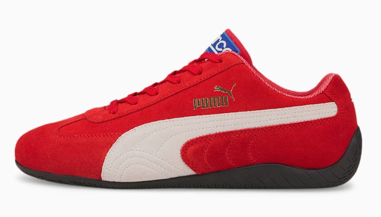 red sneakers with white stripe puma