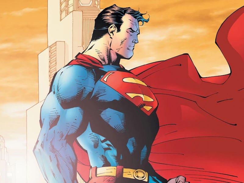 Illustration of a caped superhero in a blue suit with a red cape standing confidently against a city...