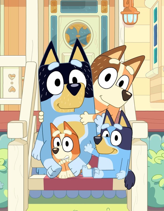 The Heeler Family from 'Bluey' on their front steps.