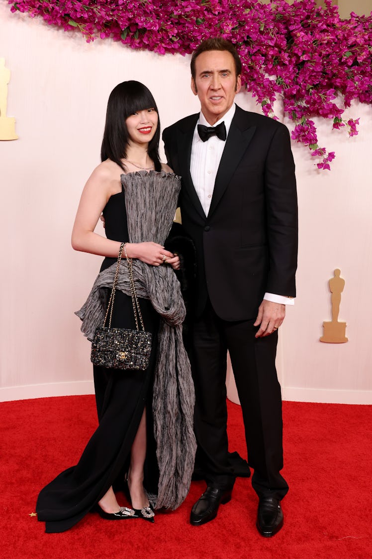 Riko Shibata and Nicolas Cage attend the 96th Annual Academy Awards on March 10, 2024 in Hollywood, ...