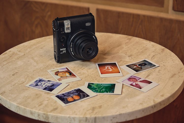The Fujifilm Instax Mini 99 is a beautiful instant camera inspired by old analog film cameras.
