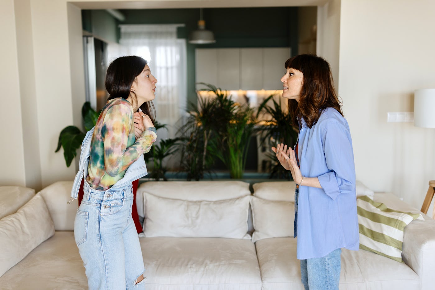 A mother and teen have a tense conversation.