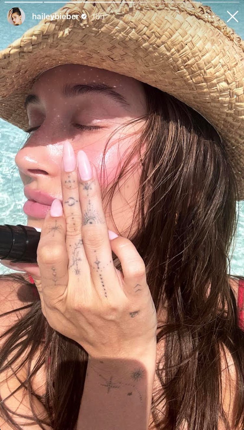 On March 5, Hailey Bieber was spotted with "strawberry milk" nails.