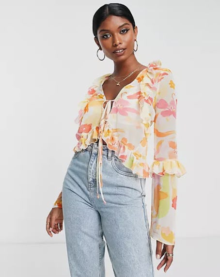 ASOS DESIGN tie front frill neck sheer blouse in print