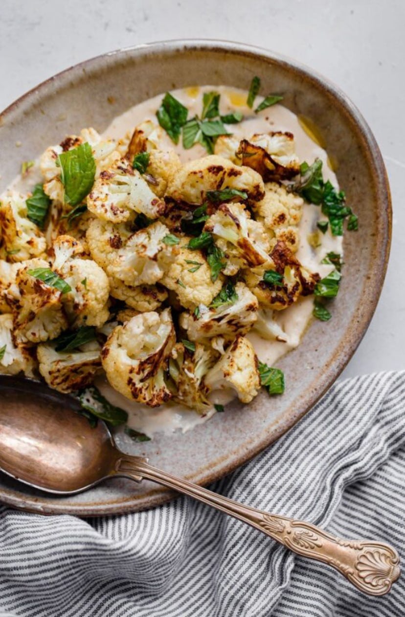 Roasted cauliflower with lemon tahini sauce is one of the best Easter dinner side dishes.