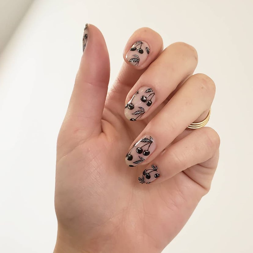 Black cherry nail art designs match the “grunge girl” aesthetic.