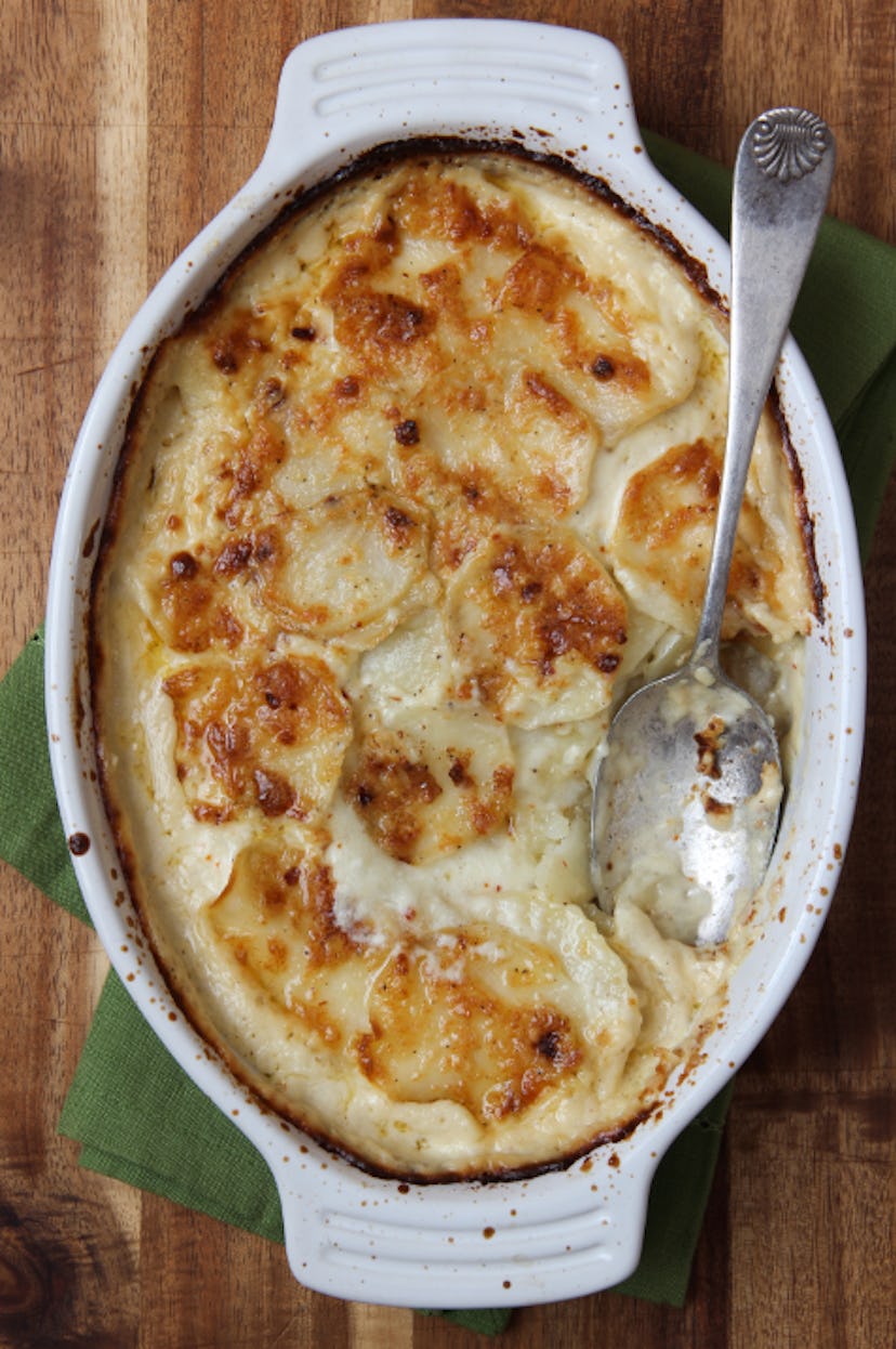 Four cheese garlic scalloped potatoes are a tasty Easter dinner side dish.