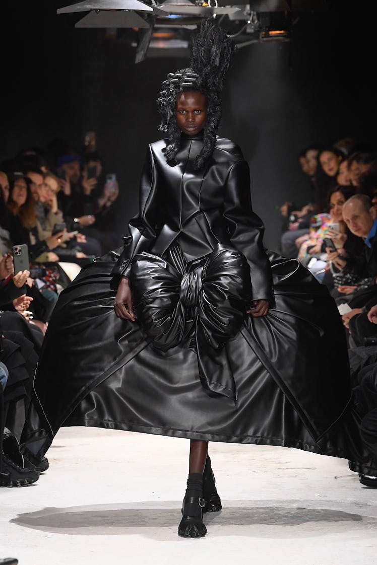Model on the runway at Comme des Garçons RTW Fall 2024 as part of Paris Ready to Wear Fashion Week h...