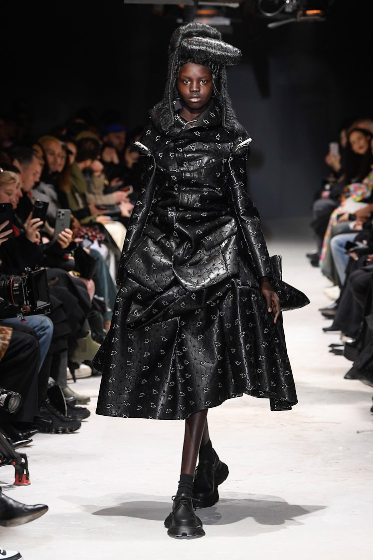 Model on the runway at Comme des Garçons RTW Fall 2024 as part of Paris Ready to Wear Fashion Week h...