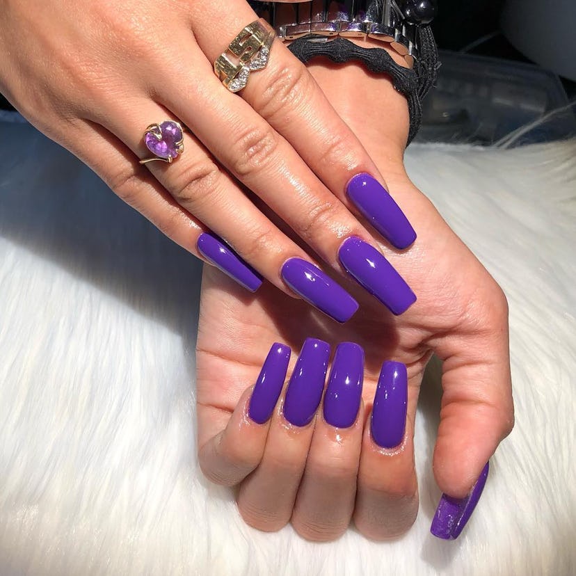 Royal purple nails will be on trend for spring 2024.