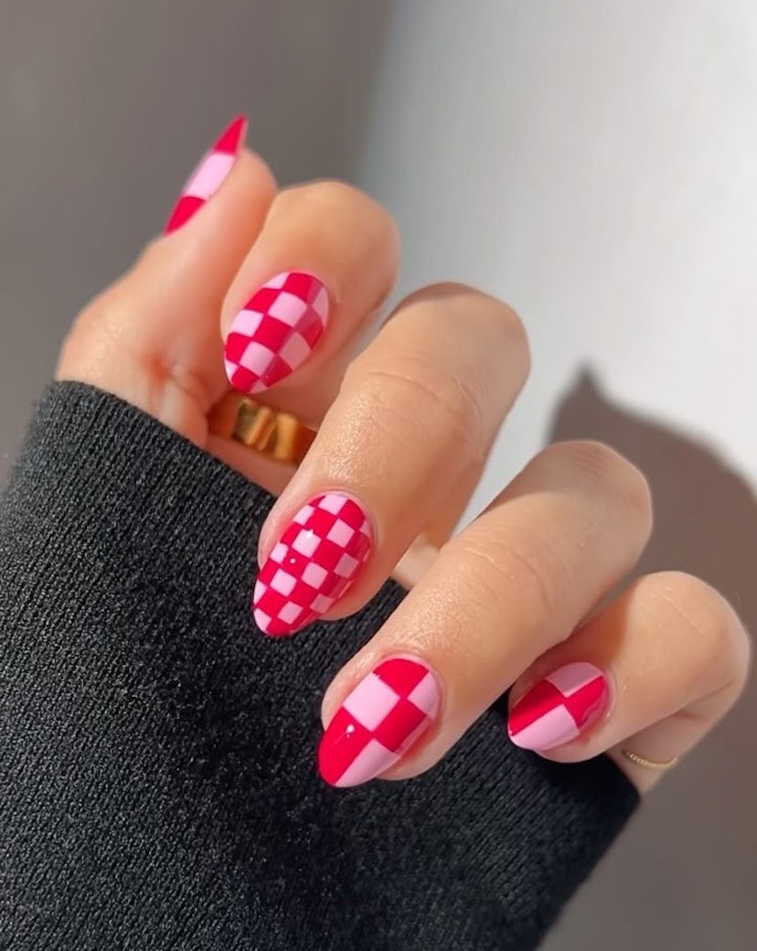 Funky checkered print nail art is trending for Aries season 2024.