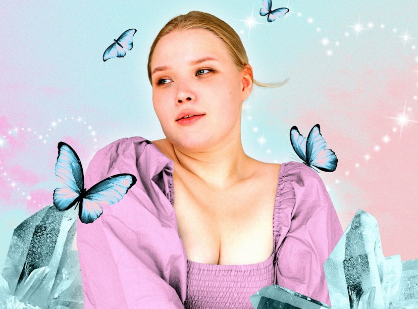 Young woman surrounded by butterflies after reading her April horoscope.