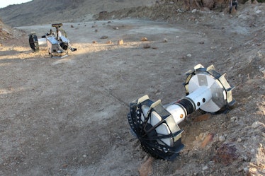image of two-wheeled rover moving down a slope, attached to another two-wheeled rover at the top