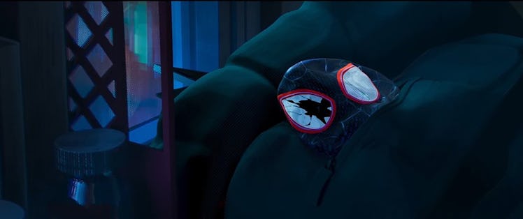Miles Morales' cracked mask in The Spider Within
