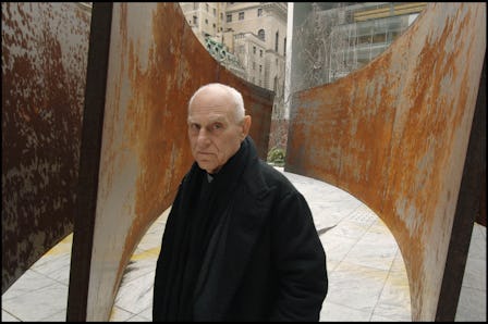 American sculptor Richard Serra at Museum Of Modern Art Sculpture Garden in New York with one of his...