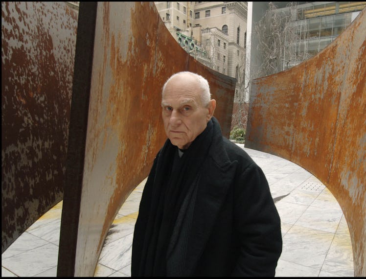 American sculptor Richard Serra at Museum Of Modern Art Sculpture Garden in New York with one of his...