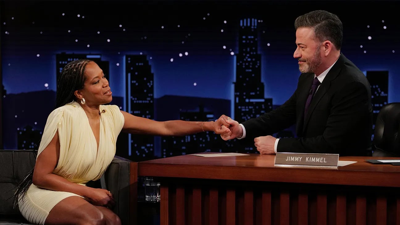 Regina King comforts Jimmy Kimmel.