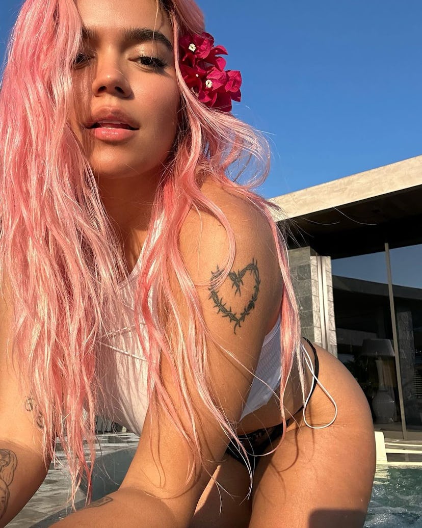 Pastel pink hair colors are trending for summer 2024.