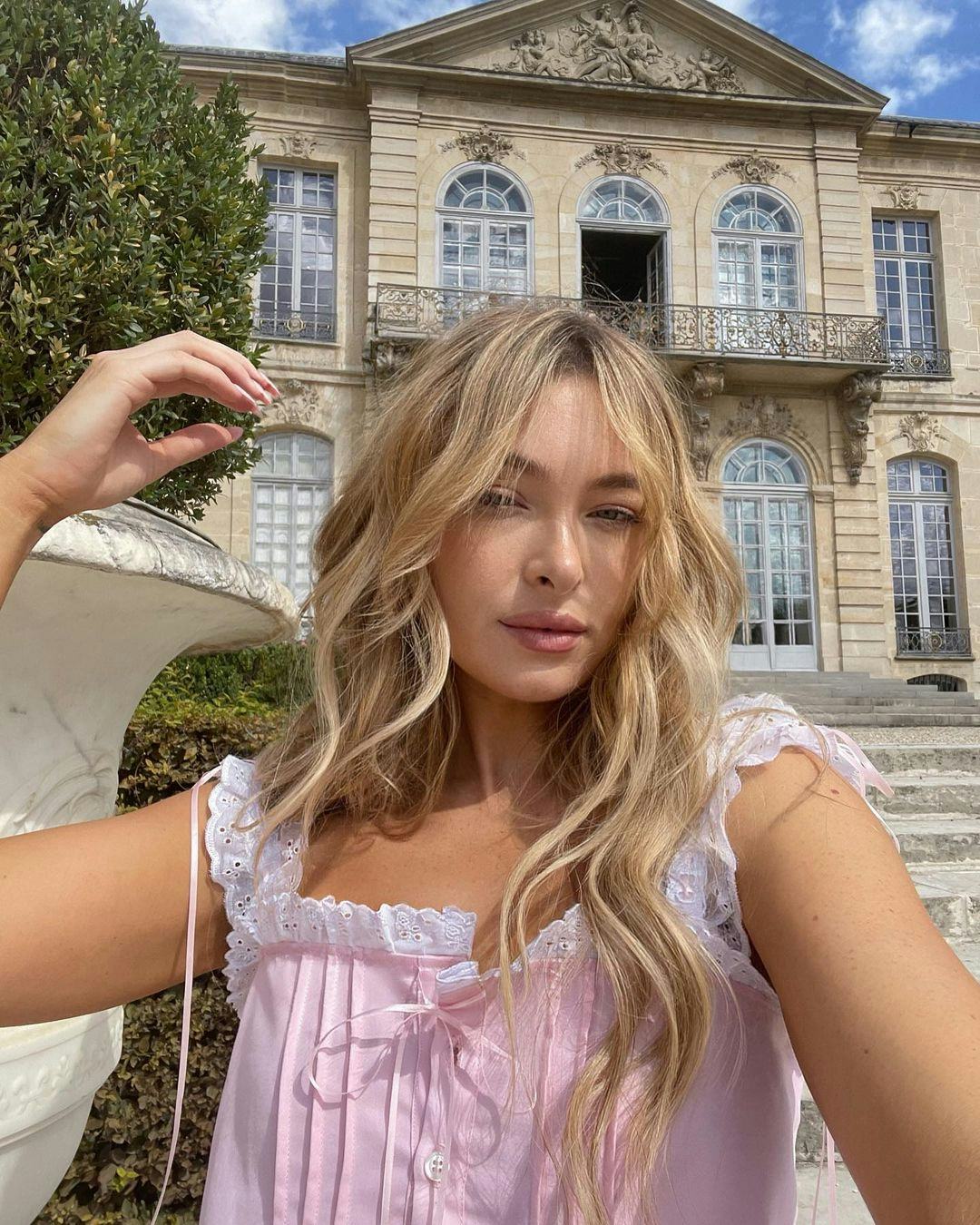 Soft, sun-kissed blonde hair colors are on-trend for summer 2024.