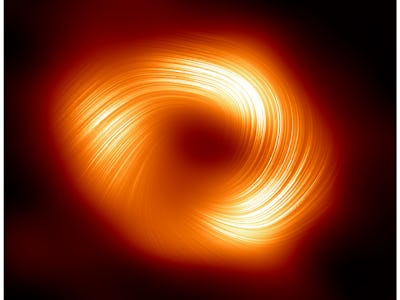 Circular swirl pattern with bright orange and yellow tones on a dark background, resembling a galaxy...