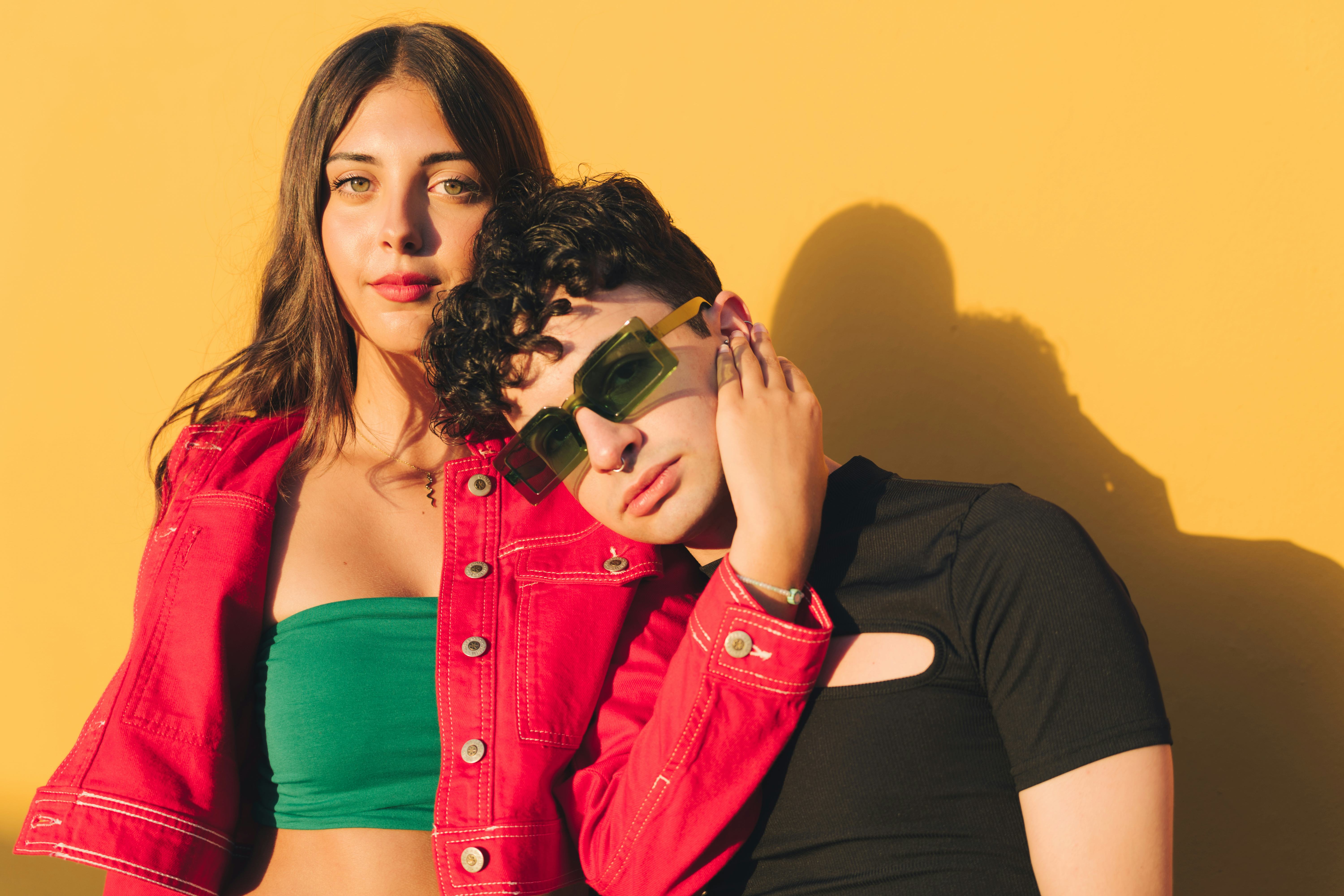 Friends leaning on each other during the 2024 total solar eclipse.