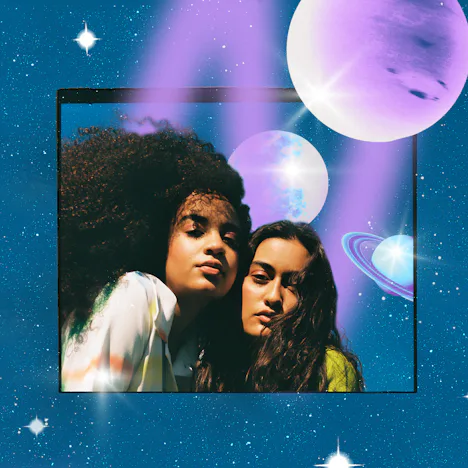 Two young women wondering how the 2024 total solar eclipse will affect their zodiac signs' horoscope...