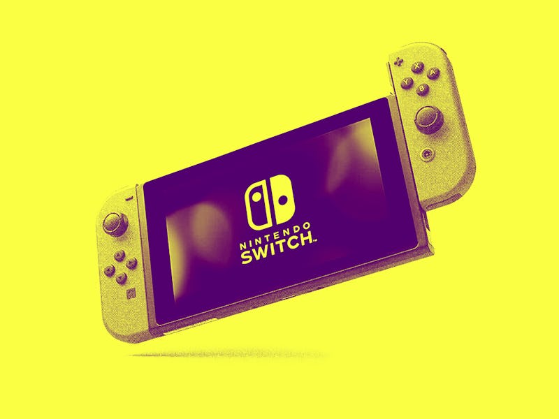 A Nintendo Switch game console with two Joy-Con controllers that can detach