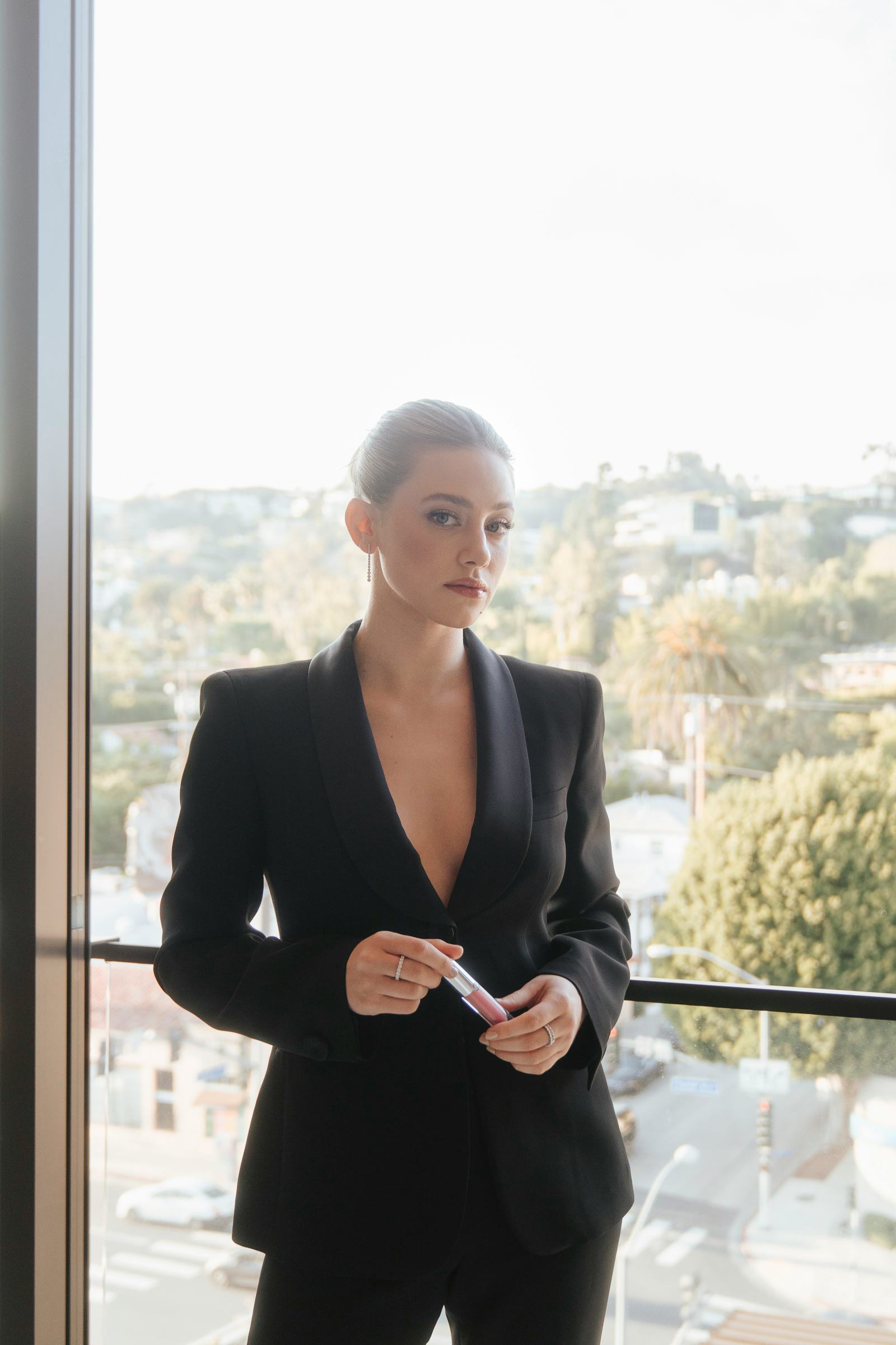 Armani Beauty ambassador, Lili Reinhart, speaks with Bustle.