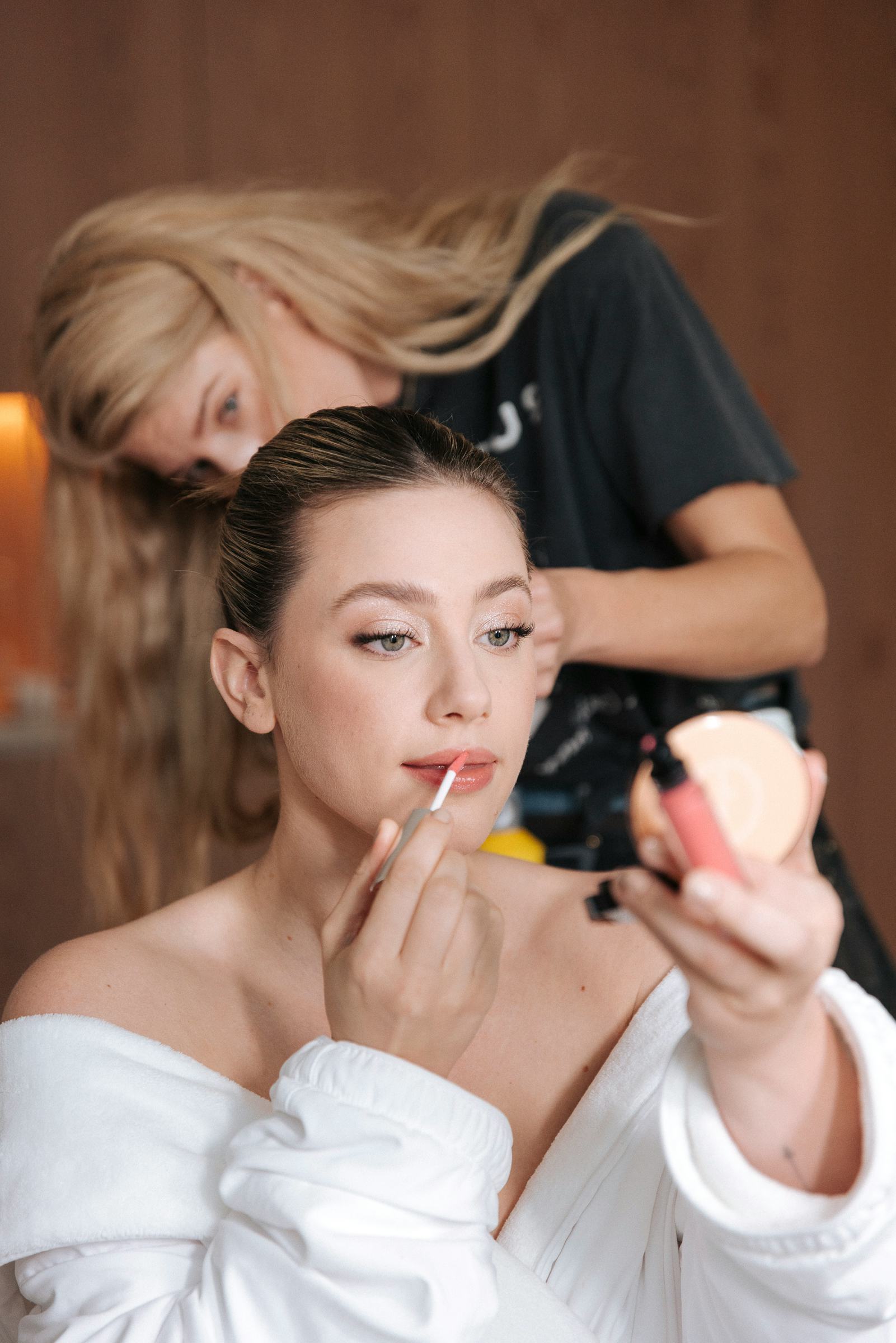 Armani Beauty ambassador, Lili Reinhart, speaks with Bustle.