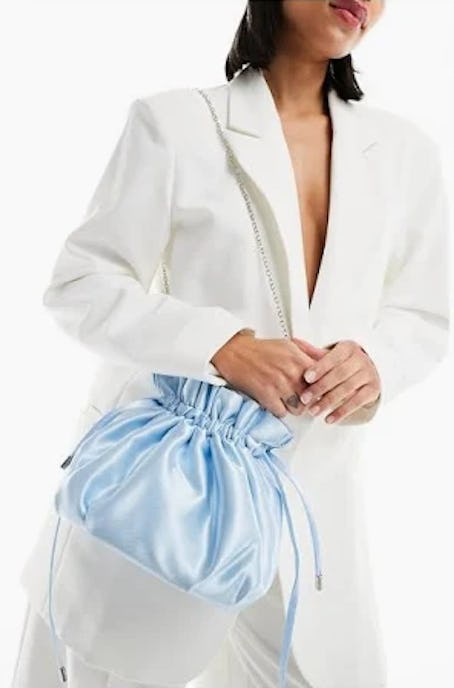 True Decadence pouch bag with chain strap in light blue satin
