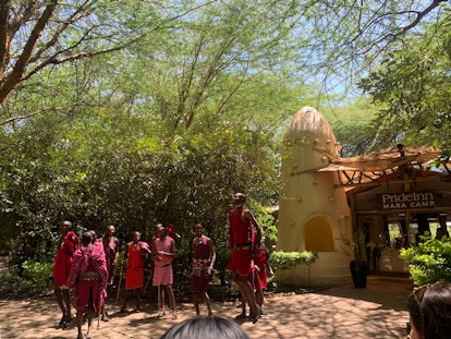 Members of the Maasai tribe greet visitors with a ceremony.