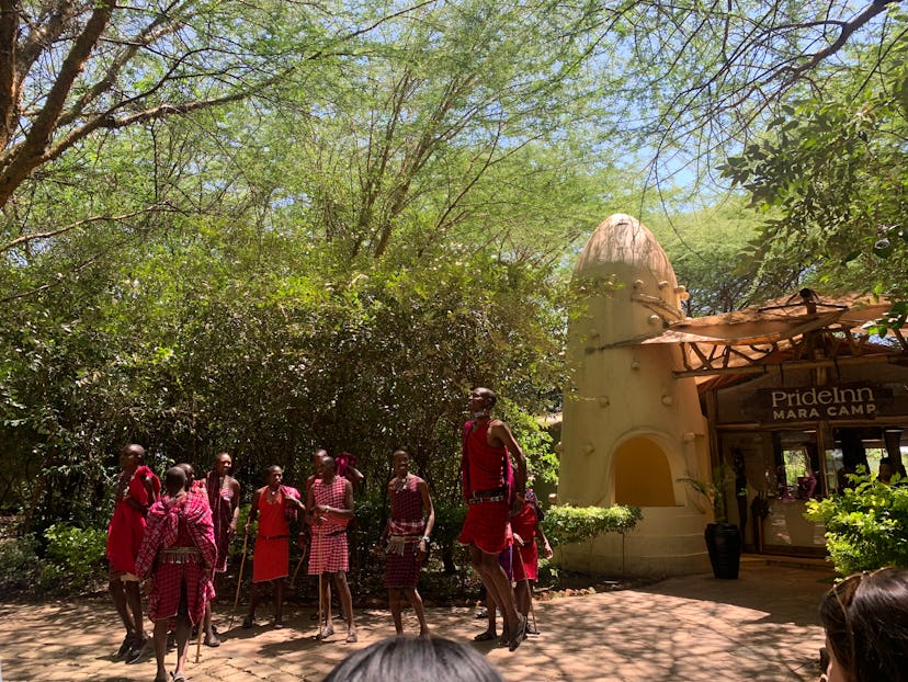 Members of the Maasai tribe greet visitors with a ceremony.
